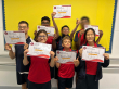 The Student Council are showing off their certificates and badges (1)