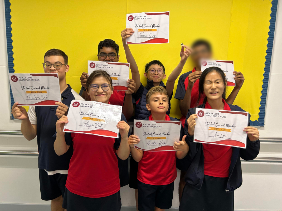 The Student Council are showing off their certificates and badges (1)